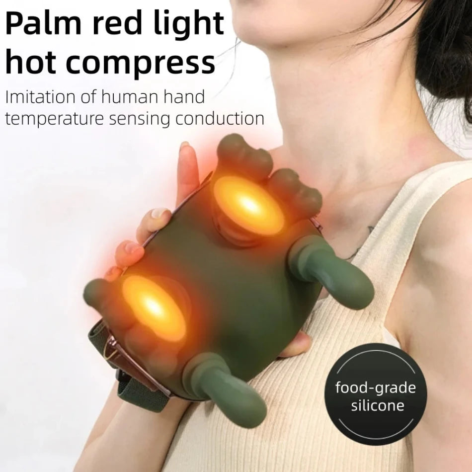 Palm-shaped red light hot compress with glowing interior, held by a person, on a white background.